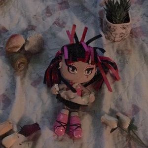 A pink and black toy good for your kid